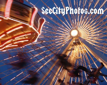 Swing Ride and Ferris Wheel by Ian Pritchard